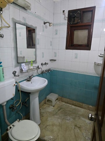 Bathroom in 2 BHK Builder Floor at Kalkaji – for Rent