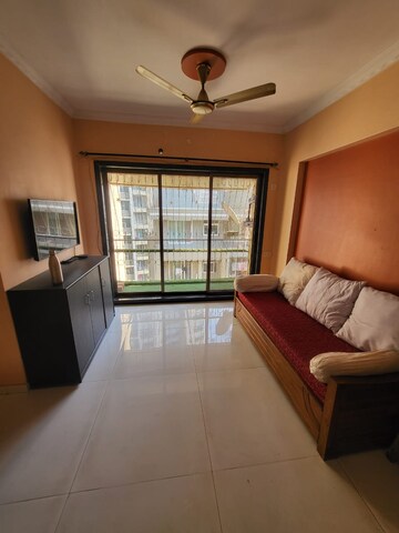 Living Room in 2 BHK Apartment at Arch Gardens, Mira Road East – for Rent