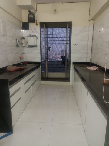 Kitchen in 2 BHK Apartment at JVM Veda, Kasarvadavali – for Sale