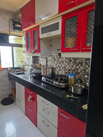 Kitchen in 3 BHK Apartment at Hill View CHS Haware City, Haware City – for Sale