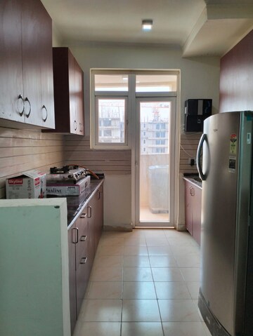 Kitchen in 3 BHK Apartment at Amrapali Silicon City, Sector 76 – for Rent