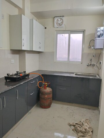 Kitchen in 3 BHK Apartment at Amrapali Silicon City, Sector 76 – for Rent