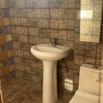 Bathroom in 3 BHK Apartment at Sushma Joynest ZRK, Ghazipur – for Rent