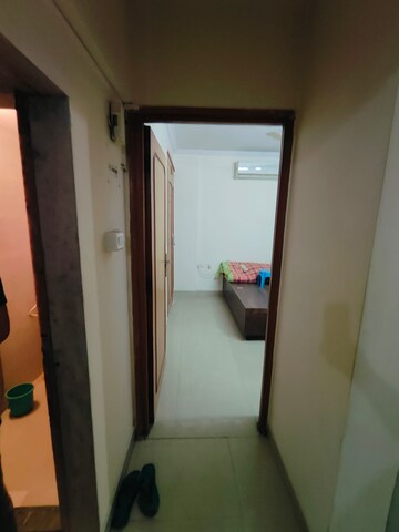 Living Room in 1 BHK Apartment at Shubharambh Complex, Manpada – for Rent