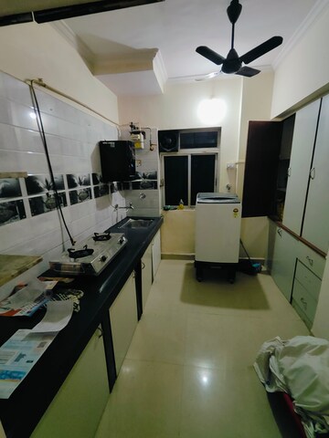 Kitchen in 1 BHK Apartment at Shubharambh Complex, Manpada – for Rent