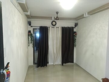 Living Room in 2 BHK Apartment at Sumit Greendale, Virar West – for Rent
