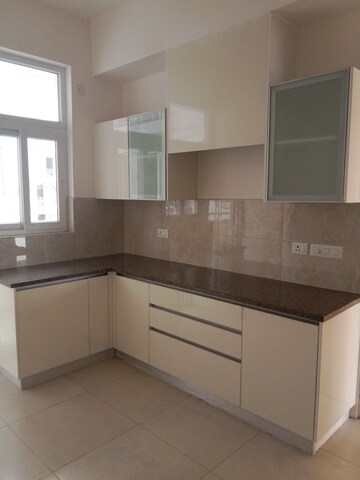 Kitchen in 4 BHK Apartment at Vatika Sovereign Park, Sector 99 – for Sale