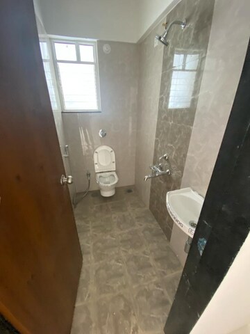 Bathroom in 3 BHK Apartment at Vyas Niranka CHS, Kothrud – for Rent