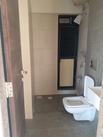 Bathroom in 2 BHK Apartment at Kanakia Rainforest, Andheri East – for Rent