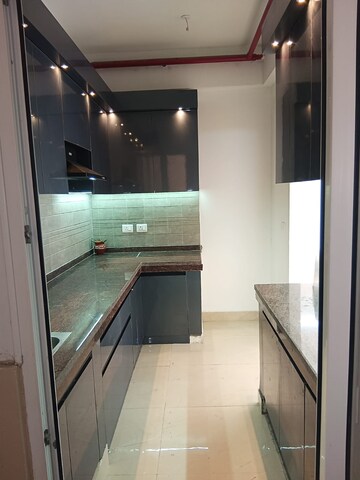 Kitchen in 2 BHK Apartment at Ace Divino, Sector 1 Greater Noida – for Rent