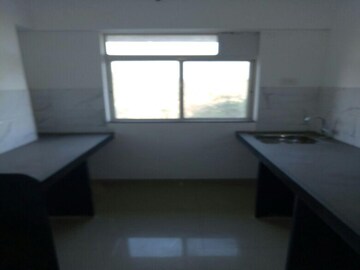 Kitchen in 2 BHK Apartment at Aadi LA Promenade Baywalk, Ambivali – for Sale