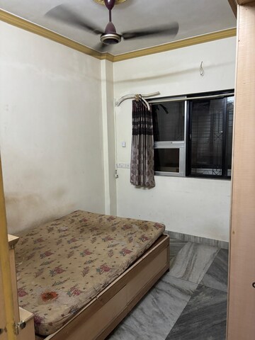 Bedroom in 2 BHK Apartment at New Satara CHS, Kopar Khairane – for Rent