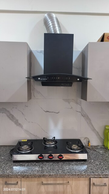 Kitchen in 3 BHK Apartment at Affinity Greens, International Airport Road – for Rent