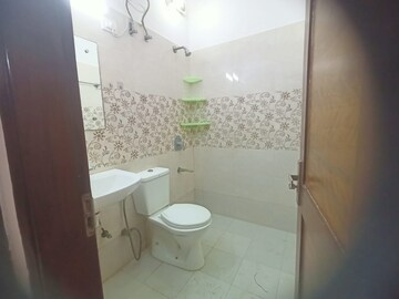 Bathroom in 2 BHK Apartment at Ansal Sushant Lok I, Sector 43 – for Rent