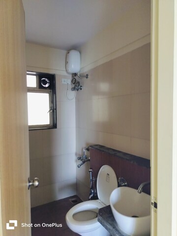 Bathroom in 3 BHK Apartment at Jangid Galaxy, Ghodbunder Road – for Rent