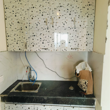 Kitchen in Studio Apartment at Ocean Golden I, Amrapali Leisure Valley – for Rent