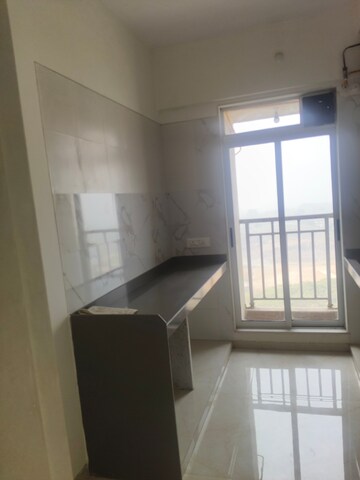 Kitchen in 1 BHK Apartment at Vihang Vermont, Ghodbunder Road – for Rent