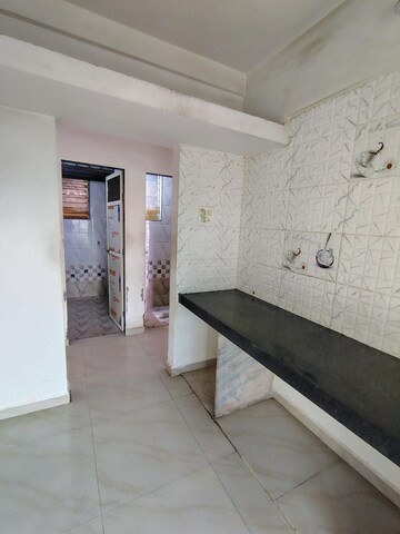 Building Lobby in 1 BHK Apartment at Thanekar Hillcrest, Badlapur East – for Rent