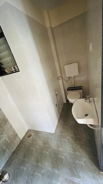Bathroom in 1 BHK Apartment at Rajaram Sukur Sapphire, Ghodbunder Road – for Rent