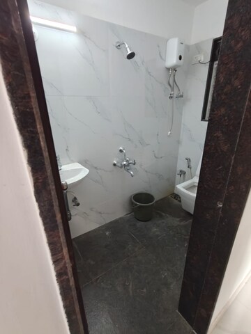 Bathroom in 2 BHK Apartment at DGS Sheetal Usha, Malad West – for Rent