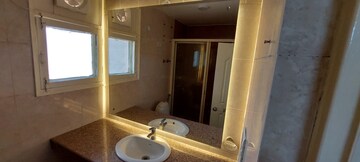 Bathroom in 4 BHK Apartment at Aditya Palm Court, Vip Road – for Rent