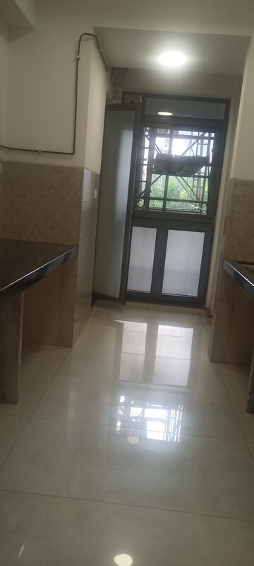 Kitchen in 2 BHK Apartment at Omkar Signet, Malad East – for Sale