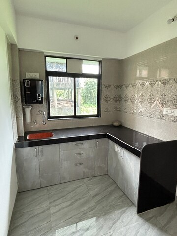 Kitchen in 1 BHK Apartment at Nirmal Sankul, Palghar – for Sale