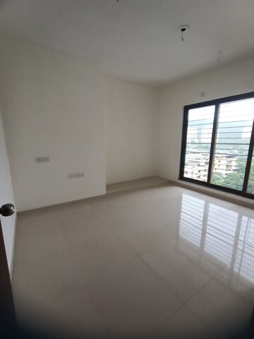 Room in 2 BHK Apartment at Acme Ozone, Manpada – for Sale