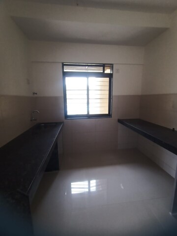 Kitchen in 2 BHK Apartment at Acme Ozone, Manpada – for Sale