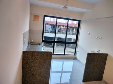 Living Room in 1 BHK Apartment at Magus City, Kon – for Sale