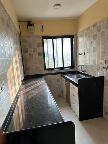 Kitchen in 1 BHK Apartment at Ruparel Sereno, Vasai East – for Sale