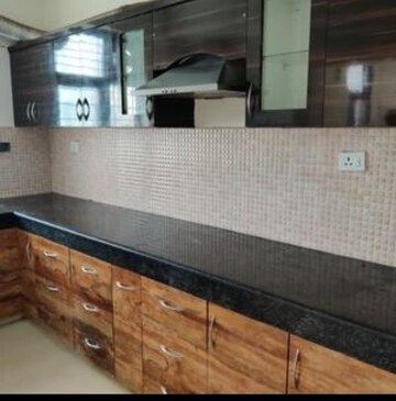 Kitchen in 2 BHK Apartment at Omega Orchid Heights, Faizabad Road – for Rent