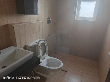 Bathroom in 2.5 BHK Apartment at Bhartiya Nikoo Homes, Thanisandra Main Road – for Sale