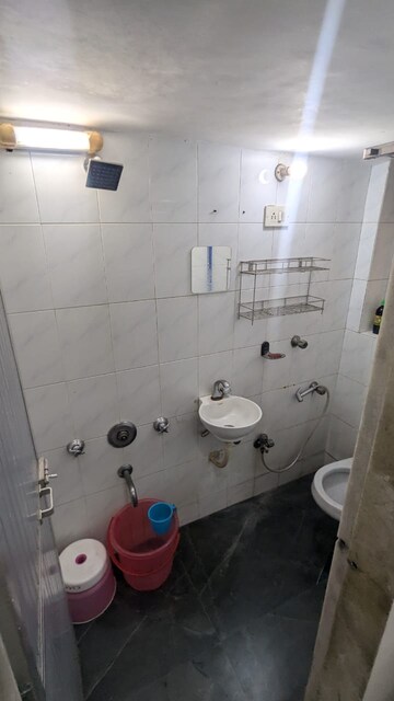 Bathroom in 2 BHK Apartment at Manisha Apartment Andheri, Andheri West – for Rent