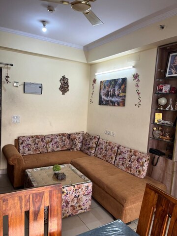 Living Room in 2 BHK Apartment at Sikka Karmic Greens, Sector 78 – for Rent