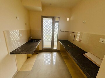 Kitchen in 2 BHK Apartment at Piramal Vaikunth, Balkum Pada – for Rent