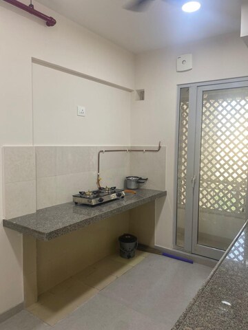 Kitchen in 2 BHK Apartment at Piramal Vaikunth, Balkum Pada – for Rent