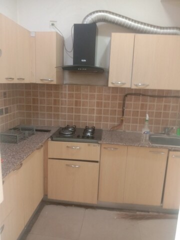 Kitchen in 3 BHK Apartment at Mahagun Mywoods, Sector 16c Greater Noida – for Rent
