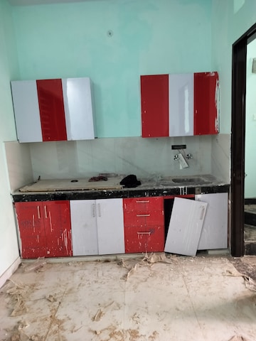 Kitchen in 2.5 BHK Apartment at Amrapali Golf Homes, Sector 4, Greater Noida – for Sale