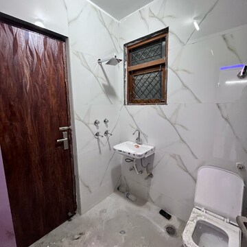 Bathroom in 3 BHK Builder Floor at Khirki Extension – for Sale