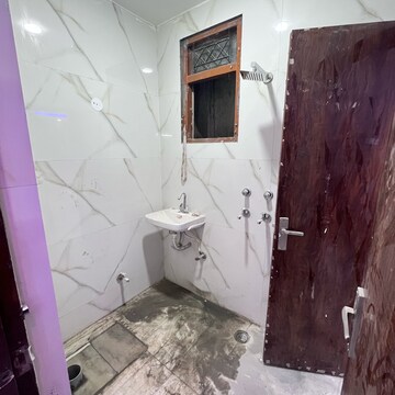 Bathroom in 3 BHK Builder Floor at Khirki Extension – for Sale