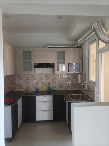 Kitchen in 2 BHK Apartment at Sector 16b Greater Noida – for Rent