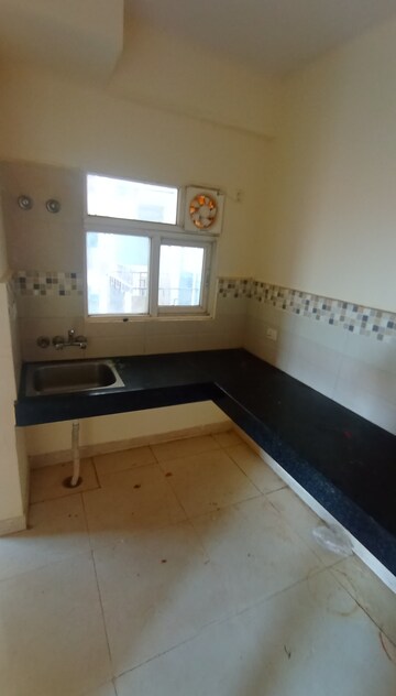 Kitchen in 2 BHK Apartment at Signature Global Orchard Avenue, Sector 93 – for Sale
