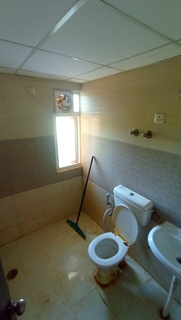 Bathroom in 2 BHK Apartment at Signature Global Orchard Avenue, Sector 93 – for Sale