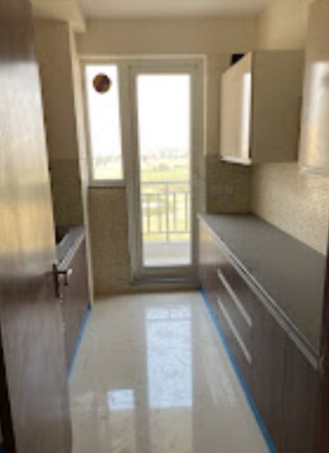 Kitchen in 2 BHK Apartment at Godrej Meridien, Sector 106 – for Sale
