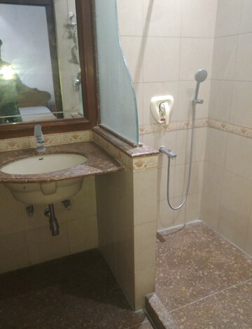 Bathroom in 2 BHK Builder Floor at Defence Colony – for Rent
