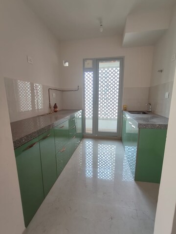 Kitchen in 2 BHK Apartment at Piramal Vaikunth, Balkum Pada – for Rent