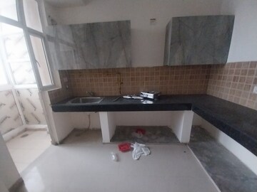 Kitchen in 3 BHK Apartment at Mahagun Mywoods, Sector 16c Greater Noida – for Rent