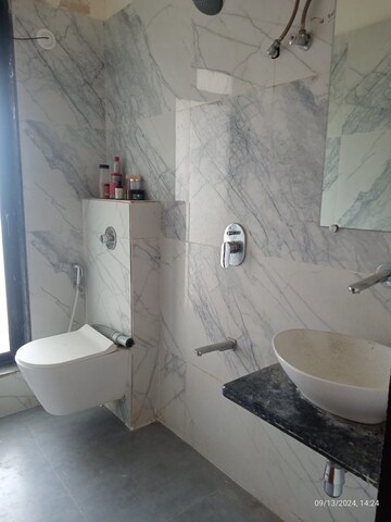 Bathroom in 2 BHK Apartment at Kamla Sukhshanti, Kandivali West – for Sale