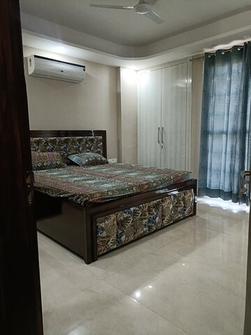 Bedroom in 4 BHK Builder Floor at Ansal Plaza Sector-23, Sector 23 – for Rent